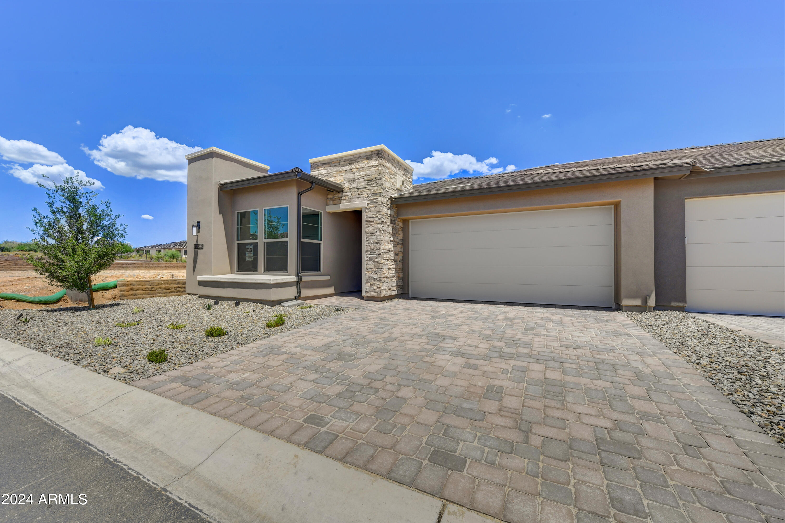 18238 East Coronado Cave Court Rio Verde, AZ 85263 - Photo 2 of 45 a view of a house with a wooden fence