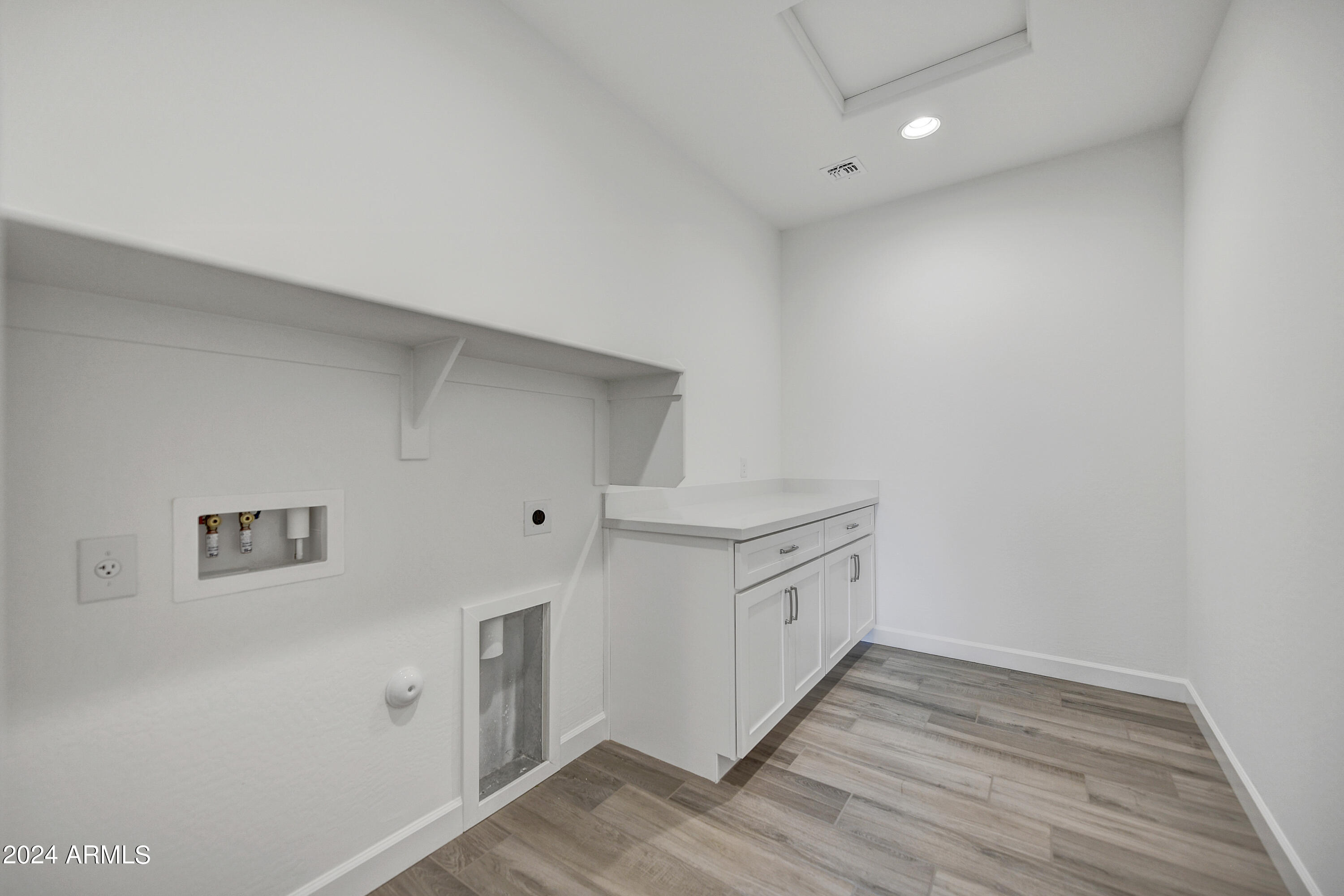 18238 East Coronado Cave Court Rio Verde, AZ 85263 - Photo 21 of 45 a view of a kitchen with cabinets and wooden floor