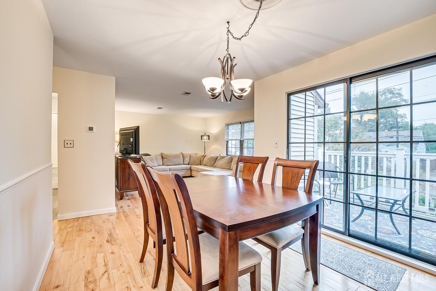 30-5 Prospect Street, Unit 2 Metuchen, NJ 08840 - Photo 8 of 23 a view of a dining room with furniture and window