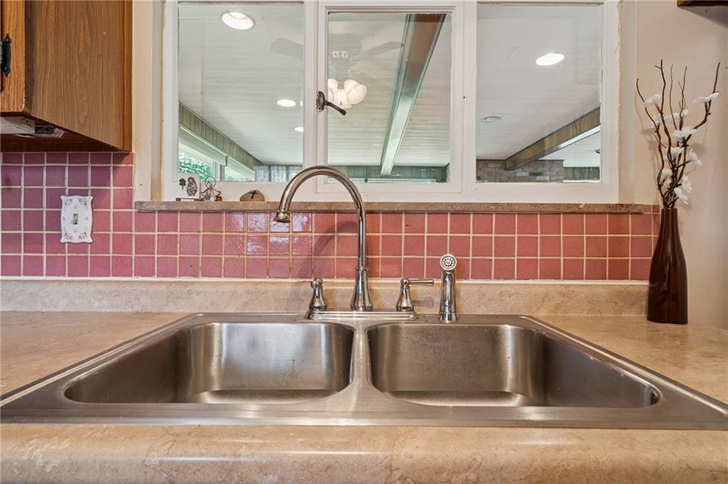 49 Millersdale Road Jeannette, PA 15644 - Photo 12 of 33 a view closeup a kitchen counter top a sink and a counter top space