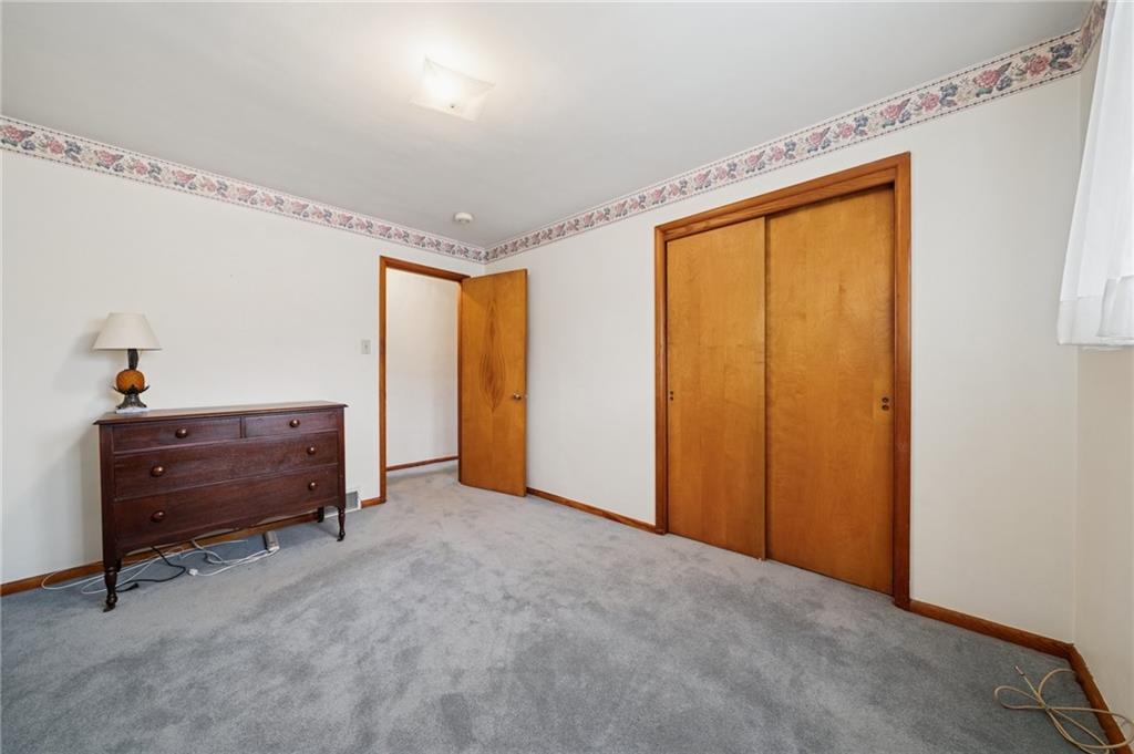 49 Millersdale Road Jeannette, PA 15644 - Photo 18 of 33 a view of an empty room with a window