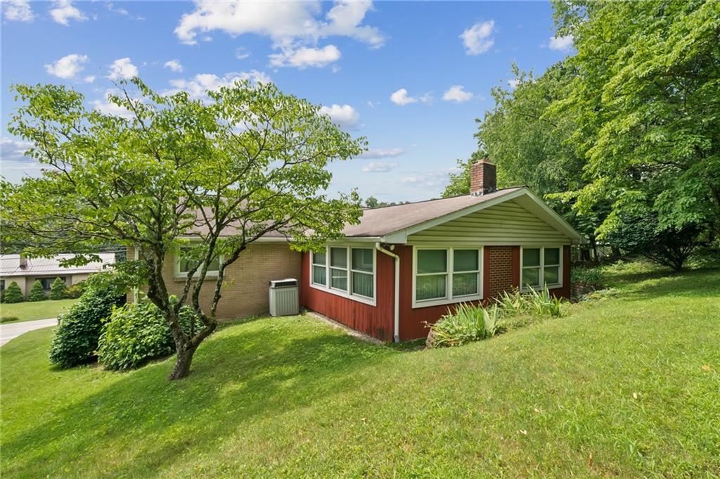 49 Millersdale Road Jeannette, PA 15644 - Photo 29 of 33 a view of a house with a yard