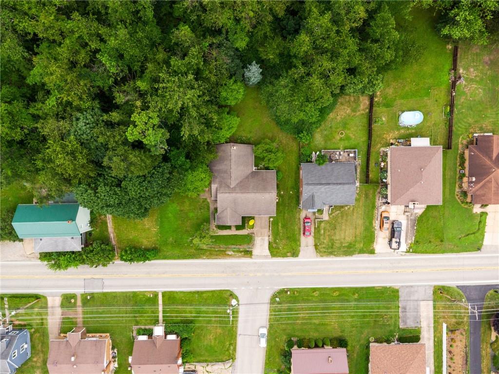 49 Millersdale Road Jeannette, PA 15644 - Photo 31 of 33 a view of a table and chairs in patio