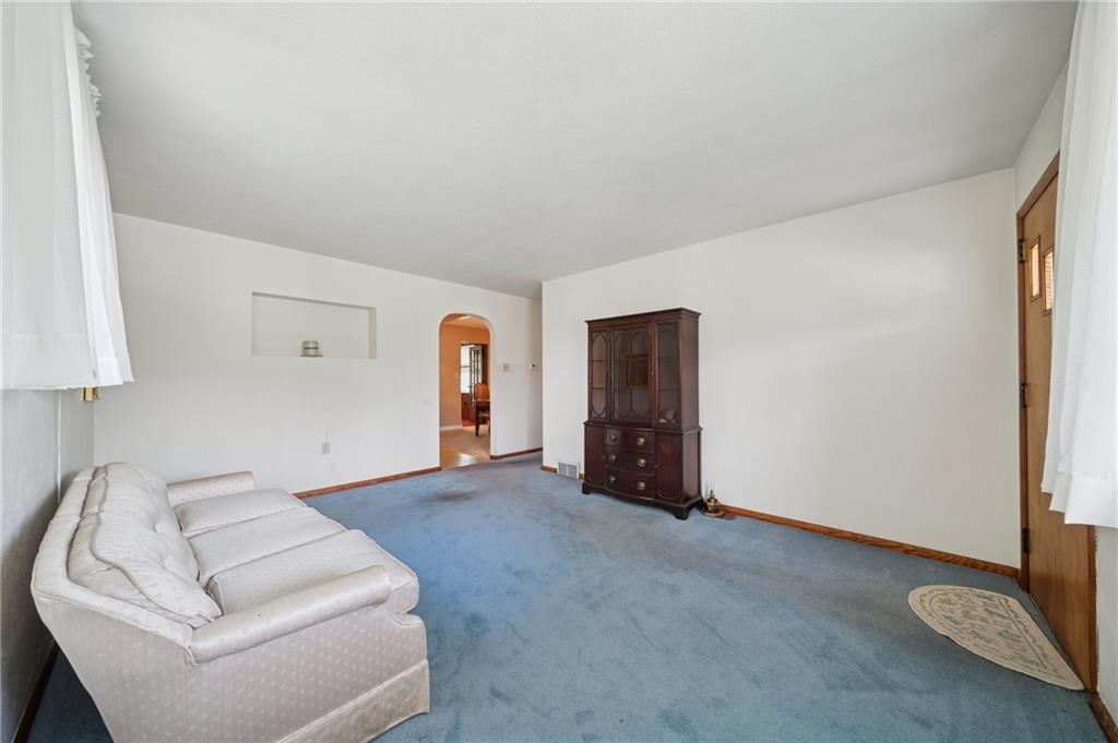 49 Millersdale Road Jeannette, PA 15644 - Photo 6 of 33 a view of livingroom with furniture and window