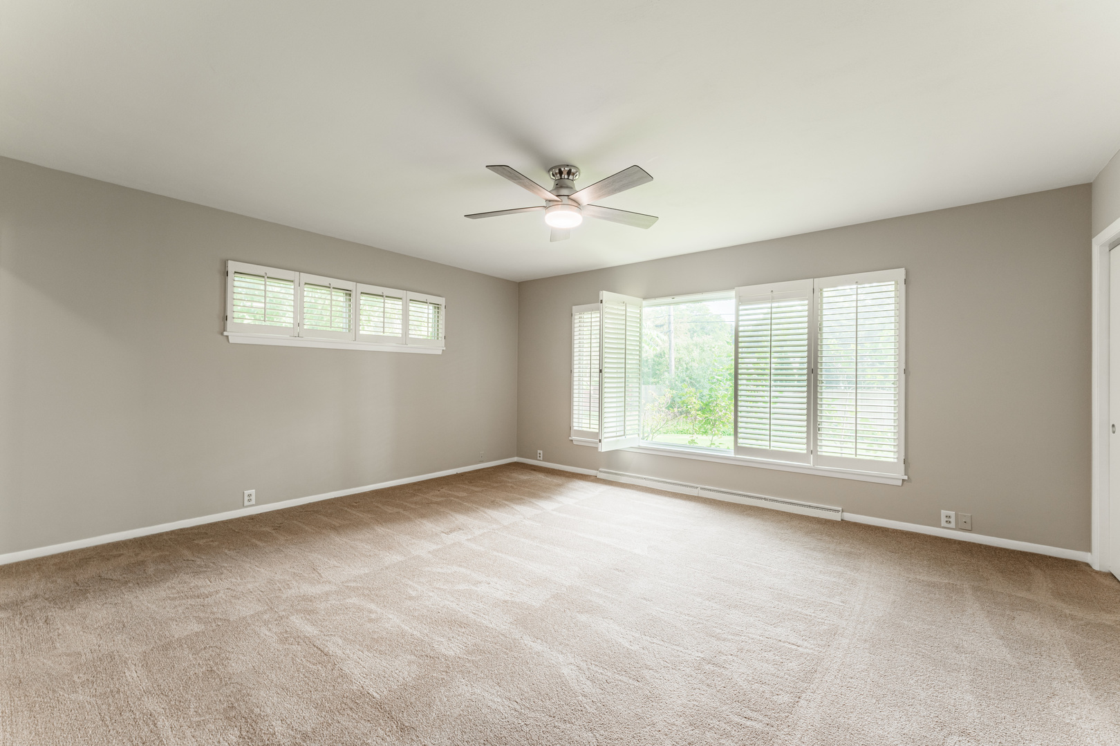 226 Windsor Drive DeKalb, IL 60115 - Photo 20 of 34 a view of an empty room with a window