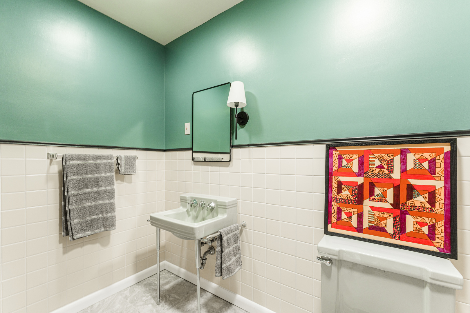 226 Windsor Drive DeKalb, IL 60115 - Photo 24 of 34 a bathroom with a sink and a mirror