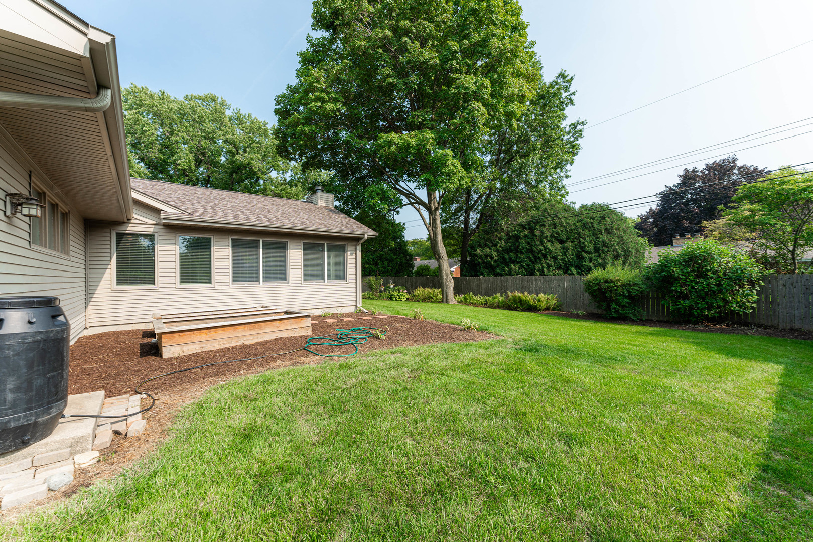 226 Windsor Drive DeKalb, IL 60115 - Photo 28 of 34 a front view of a house with a yard