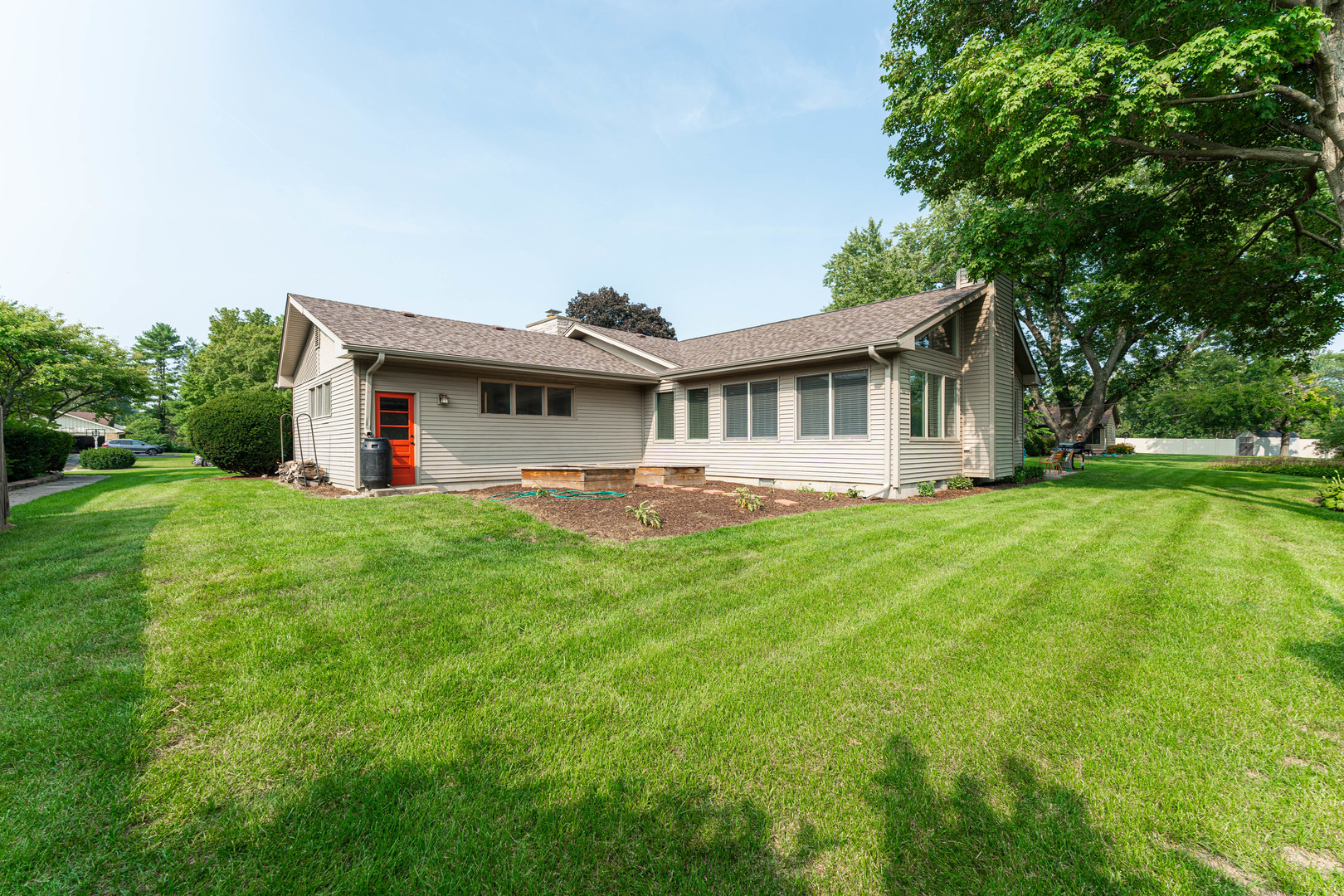 226 Windsor Drive DeKalb, IL 60115 - Photo 29 of 34 a front view of house with yard and green space