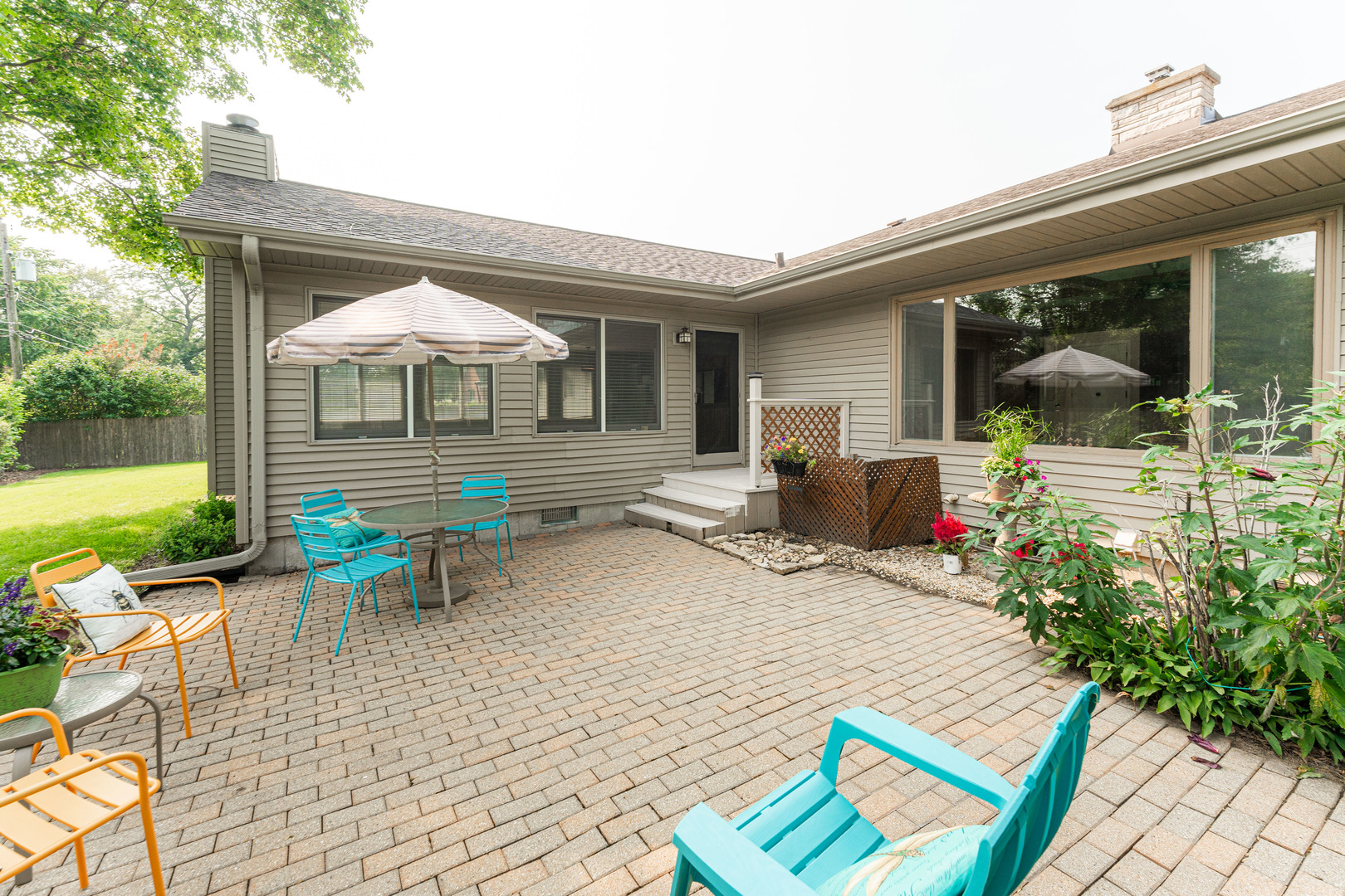 226 Windsor Drive DeKalb, IL 60115 - Photo 33 of 34 a view of a house with patio