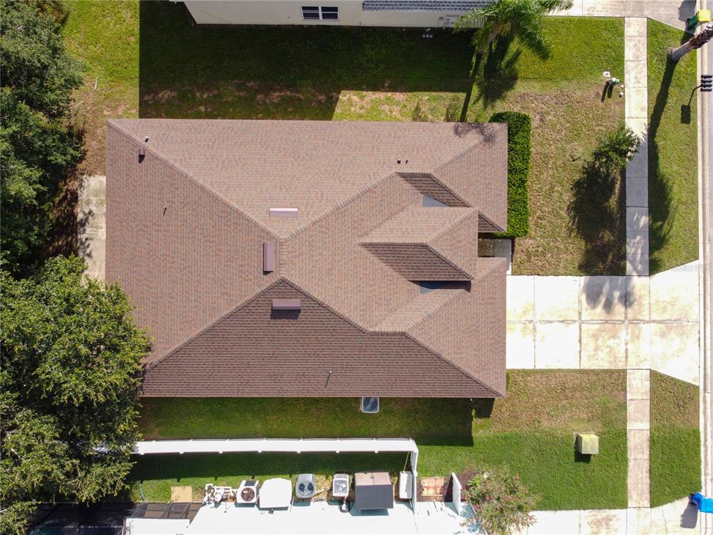 2339 Foxtree Road Tavares, FL 32778 - Photo 31 of 36 an aerial view of a house with a yard