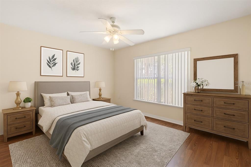 2339 Foxtree Road Tavares, FL 32778 - Photo 9 of 36 a bedroom with a bed and a dresser