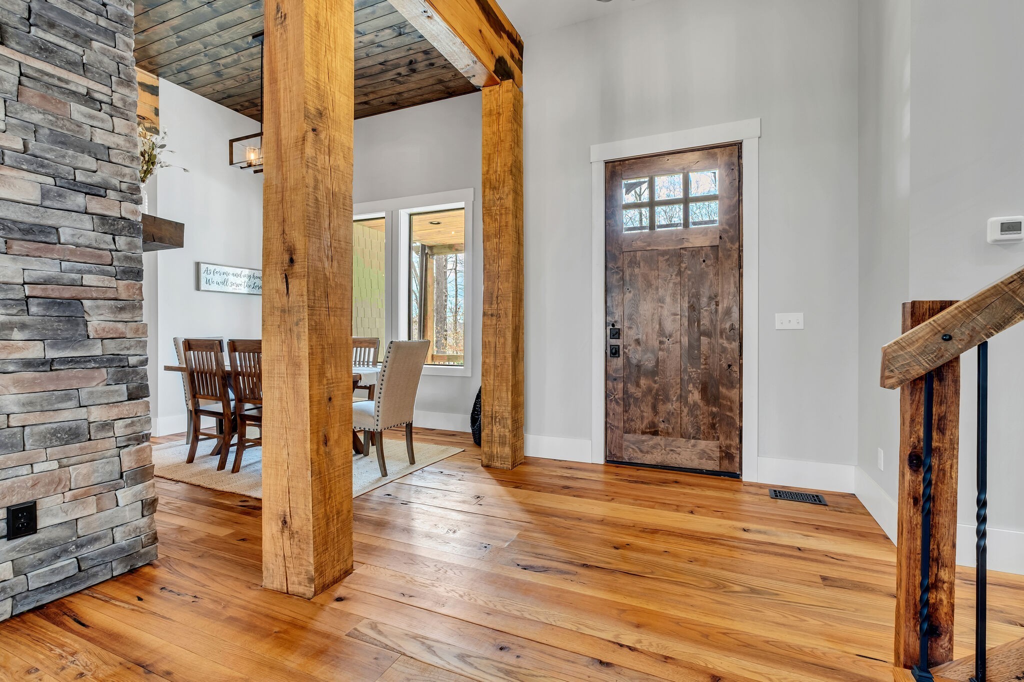 7890 Oscar Green Road Primm Springs, TN 38476 - Photo 11 of 52 a view of a livingroom with wooden floor and a fireplace