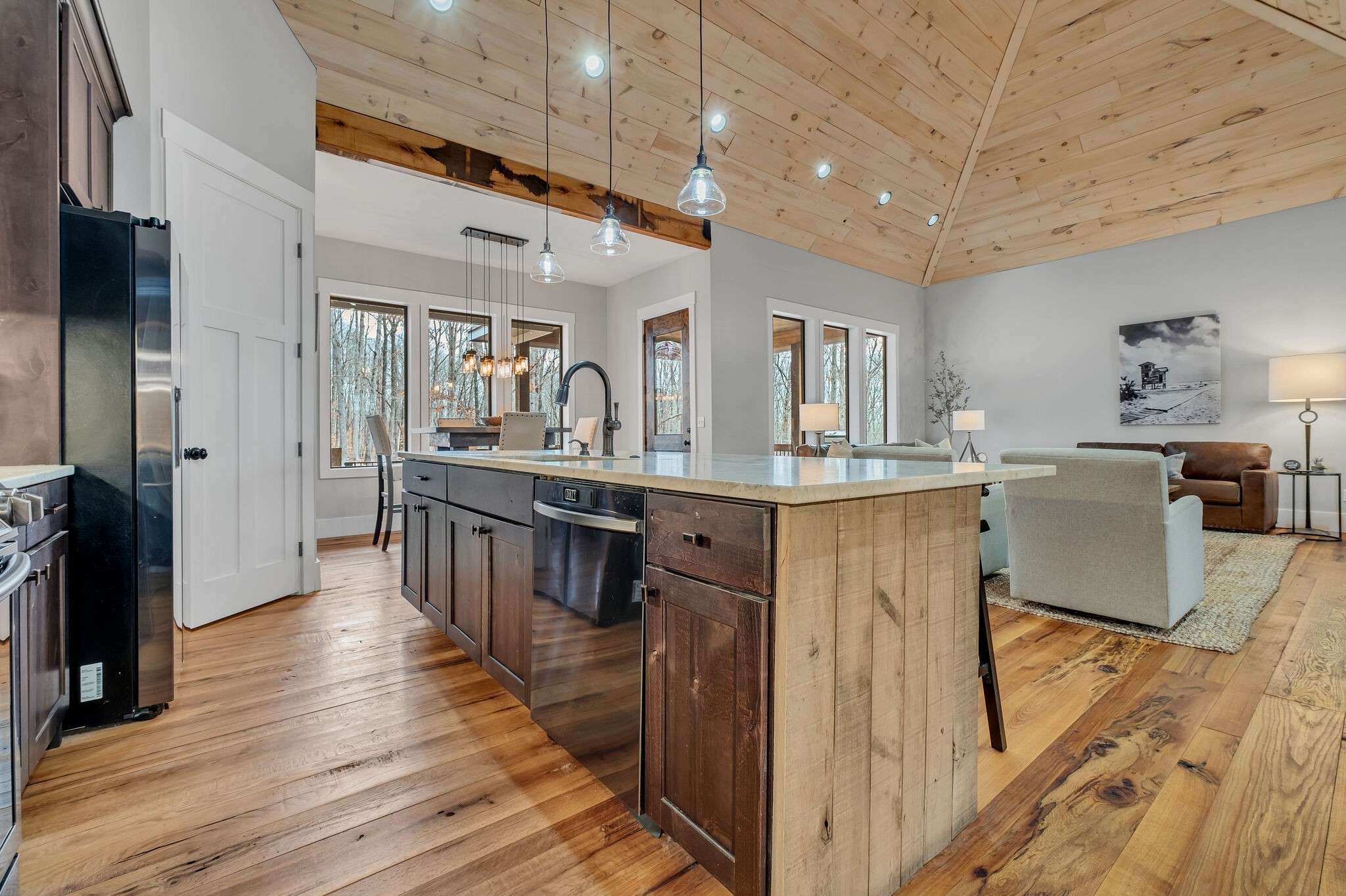 7890 Oscar Green Road Primm Springs, TN 38476 - Photo 18 of 52 a kitchen with kitchen island a counter top space a sink stainless steel appliances and cabinets