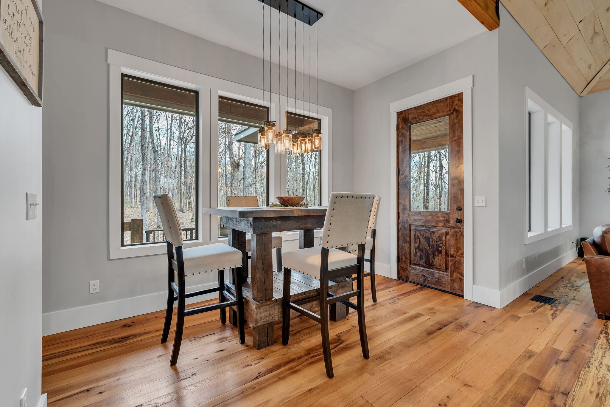 7890 Oscar Green Road Primm Springs, TN 38476 - Photo 19 of 52 a view of a dining room with furniture window and wooden floor