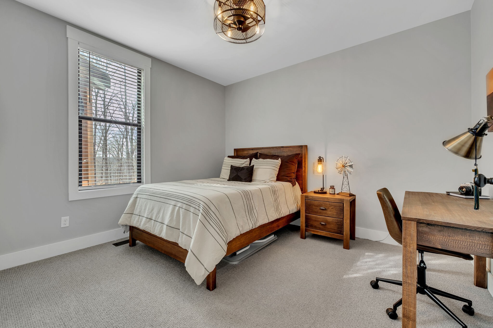 7890 Oscar Green Road Primm Springs, TN 38476 - Photo 32 of 52 a bedroom with a bed chair and a window