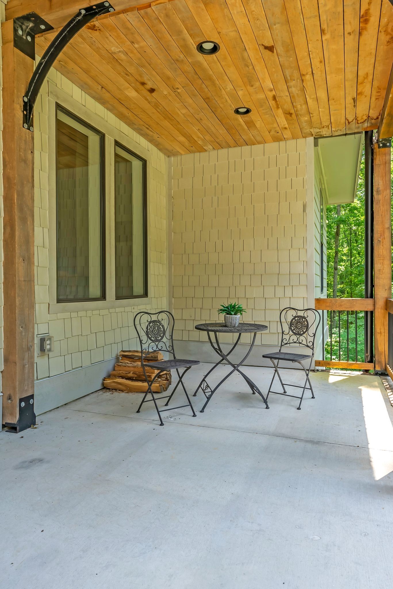 7890 Oscar Green Road Primm Springs, TN 38476 - Photo 40 of 52 a view of a patio with table and chairs and potted plants
