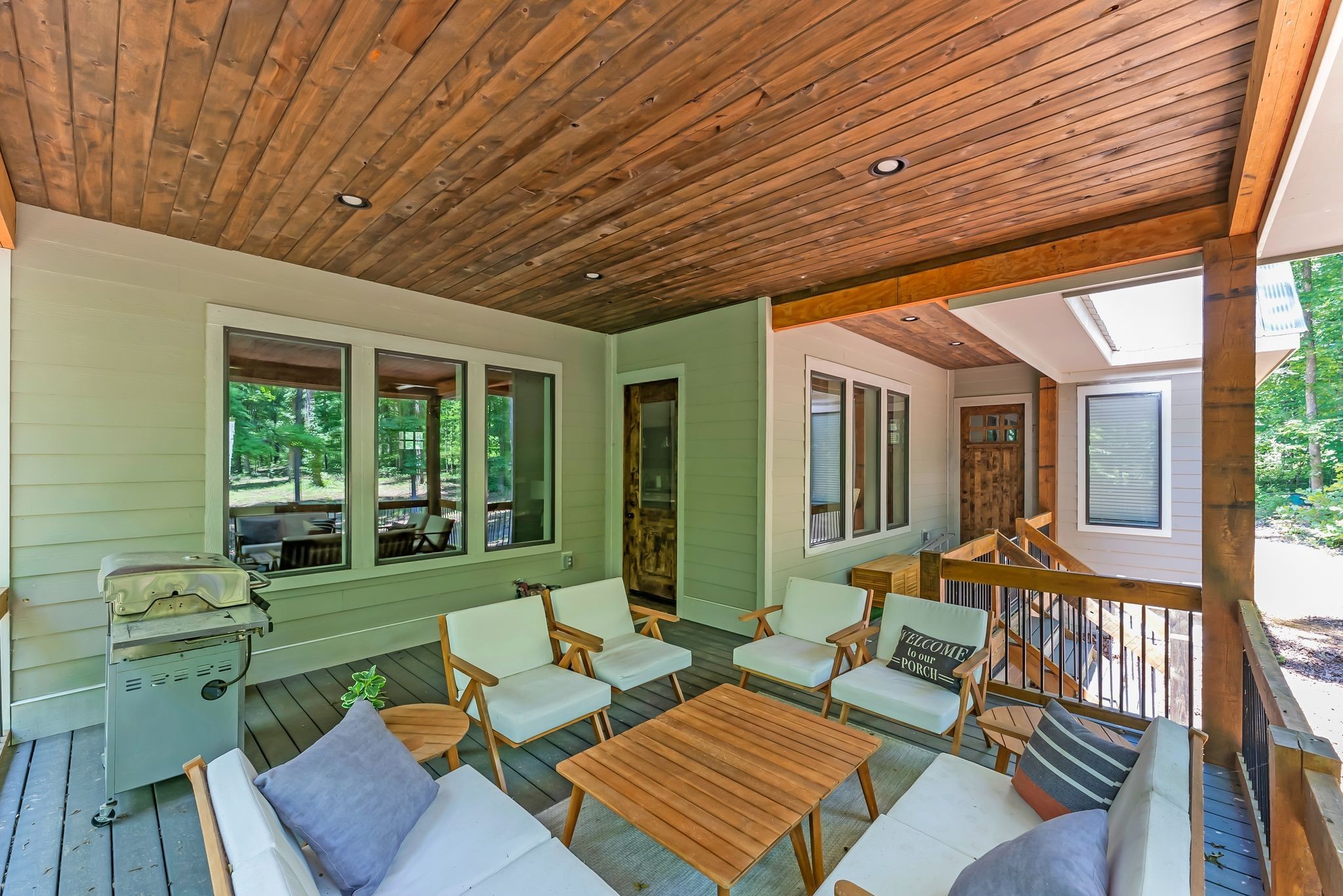 7890 Oscar Green Road Primm Springs, TN 38476 - Photo 45 of 52 a view of a patio with couches chairs and potted plants