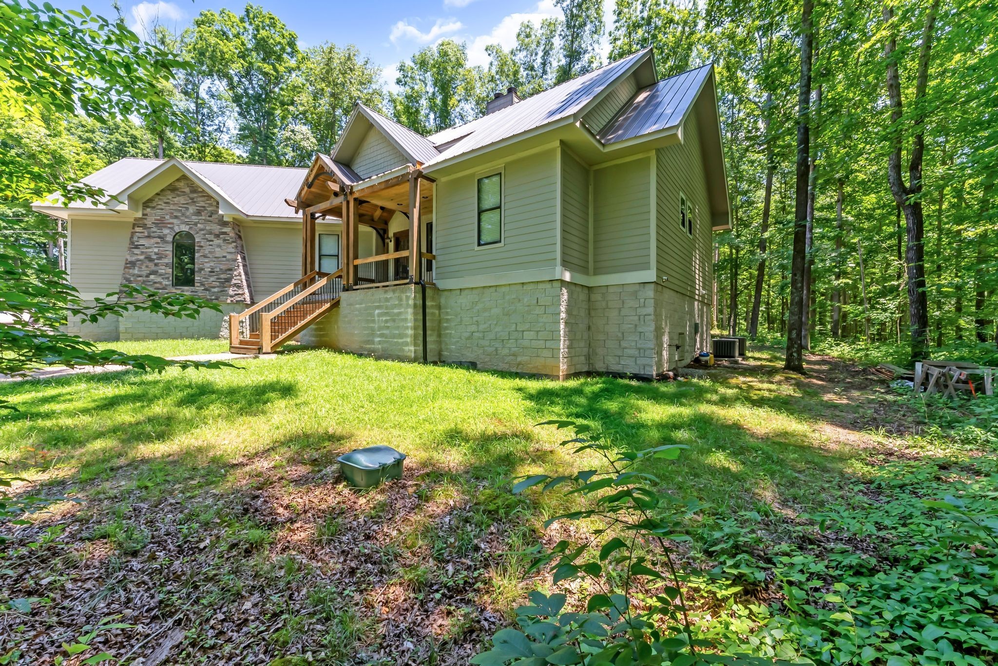 7890 Oscar Green Road Primm Springs, TN 38476 - Photo 51 of 52 a view of a backyard with small cabin