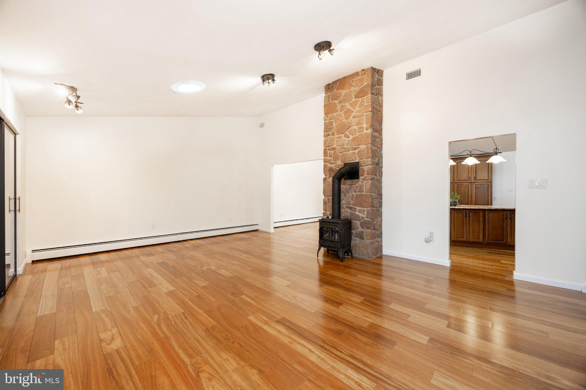 1241 Sheep Hill Road Pottstown, PA 19465 - Photo 15 of 55 Spacious room with warm wood floors.
