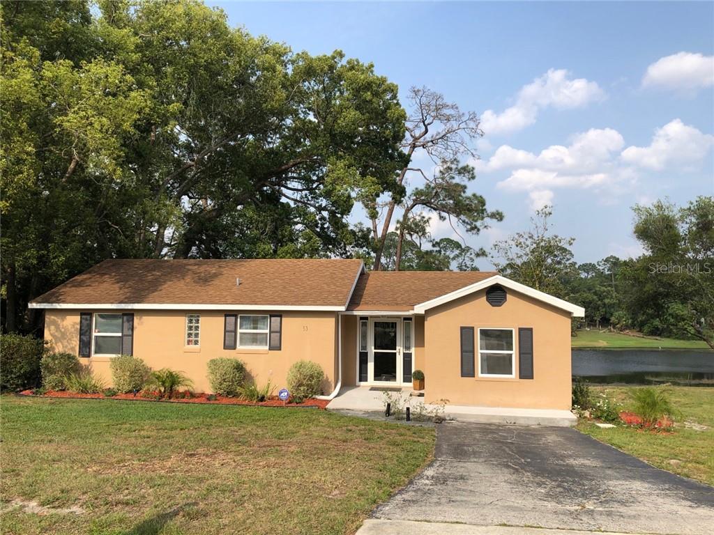 53 Alicante Road DeBary, FL 32713 - Photo 1 of 1 a front view of a house with a yard