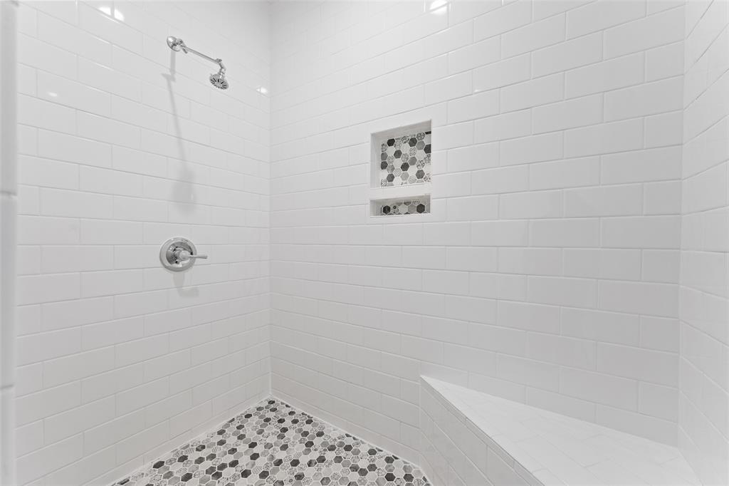 2405 Monroe Street Commerce, TX 75428 - Photo 19 of 31 a bathroom with a shower