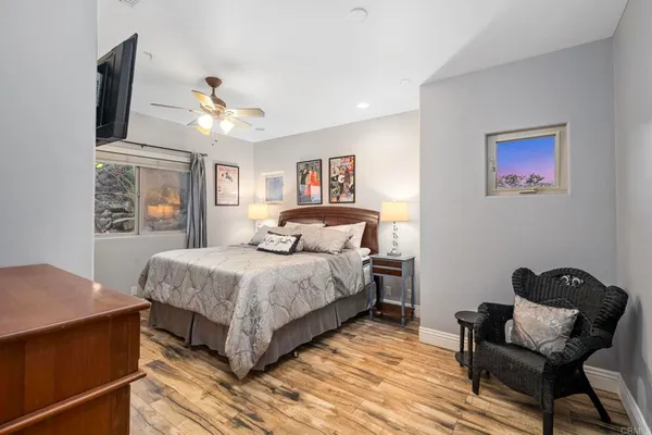 a view of a house with a yard and street view