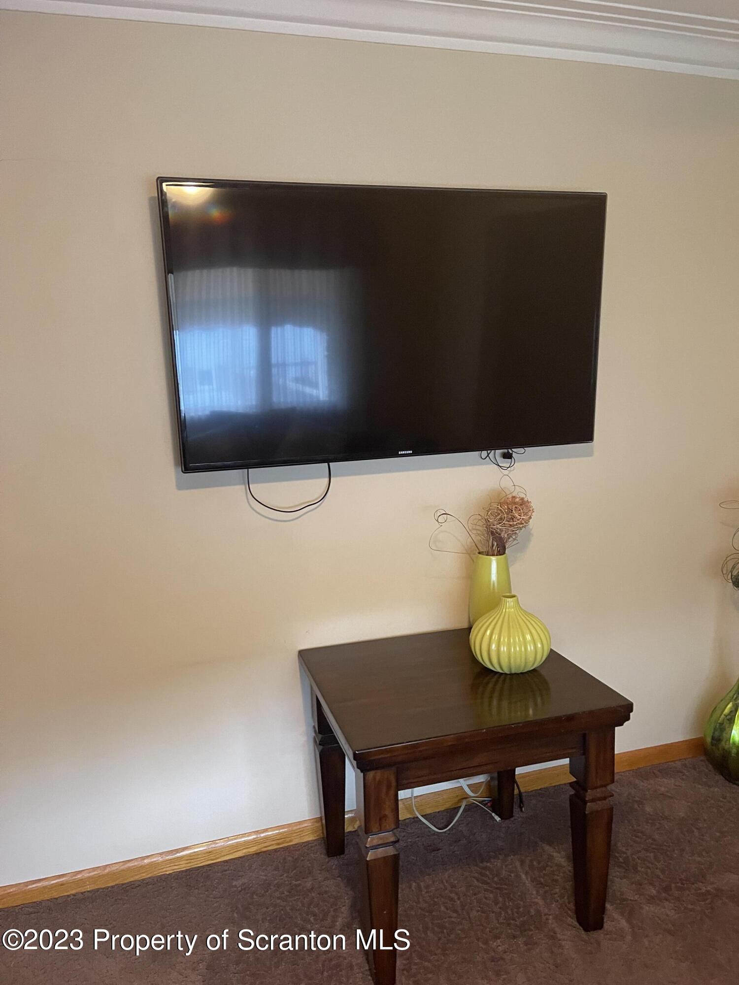 225 Main Street Olyphant, PA 18447 - Photo 27 of 60 a view of a workspace with a table and chairs