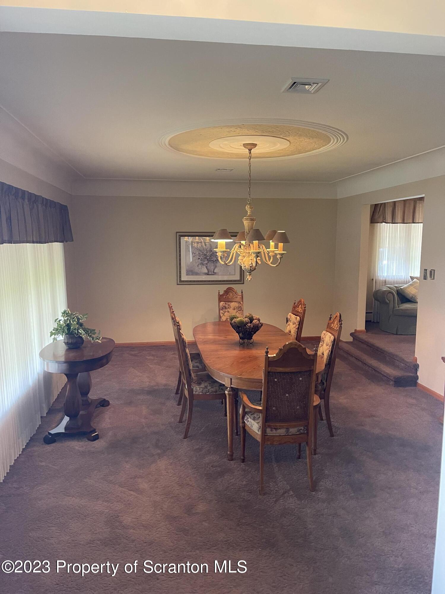 225 Main Street Olyphant, PA 18447 - Photo 28 of 60 a view of a dining room with furniture