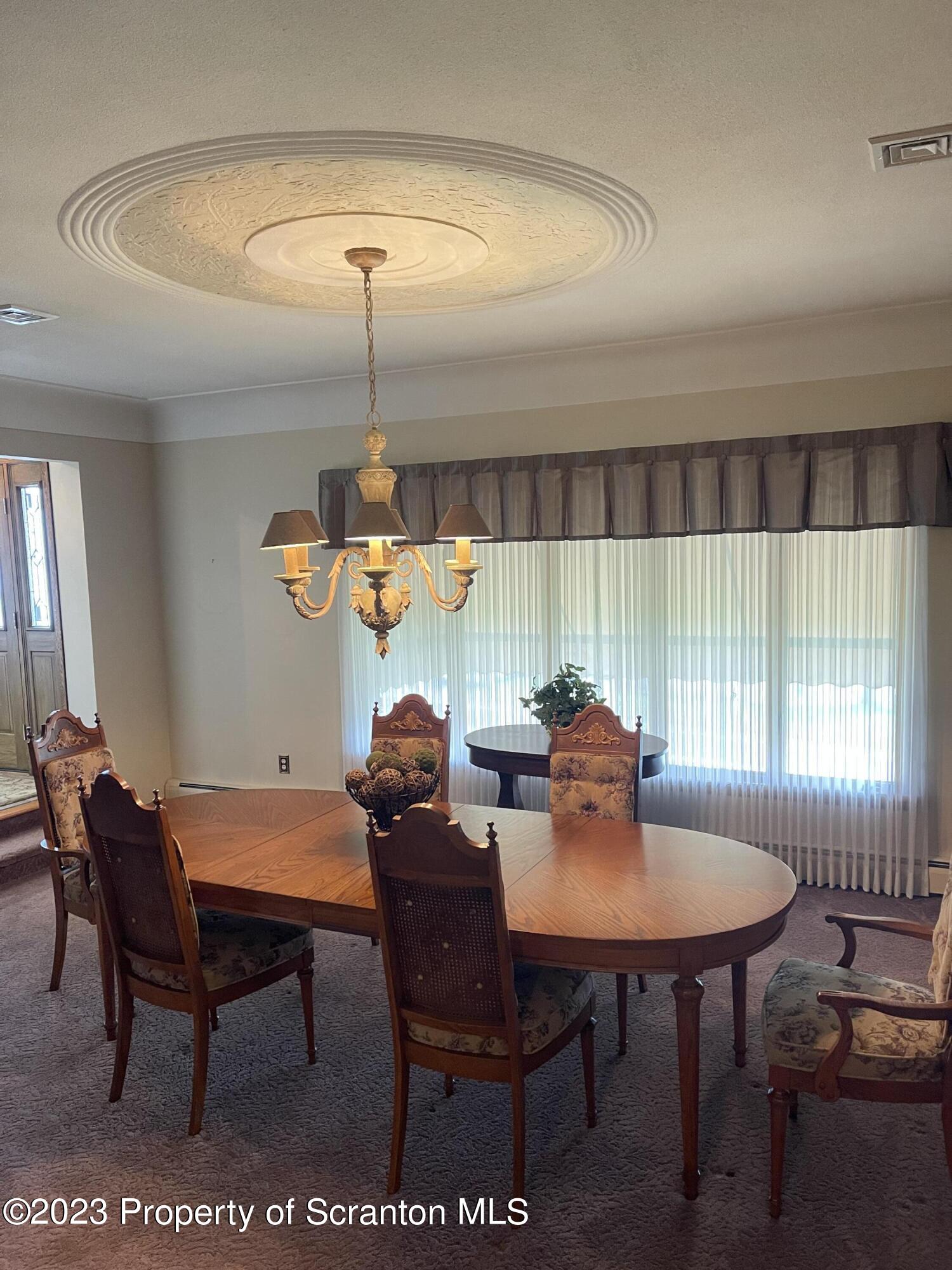 225 Main Street Olyphant, PA 18447 - Photo 30 of 60 a dining room with furniture and window