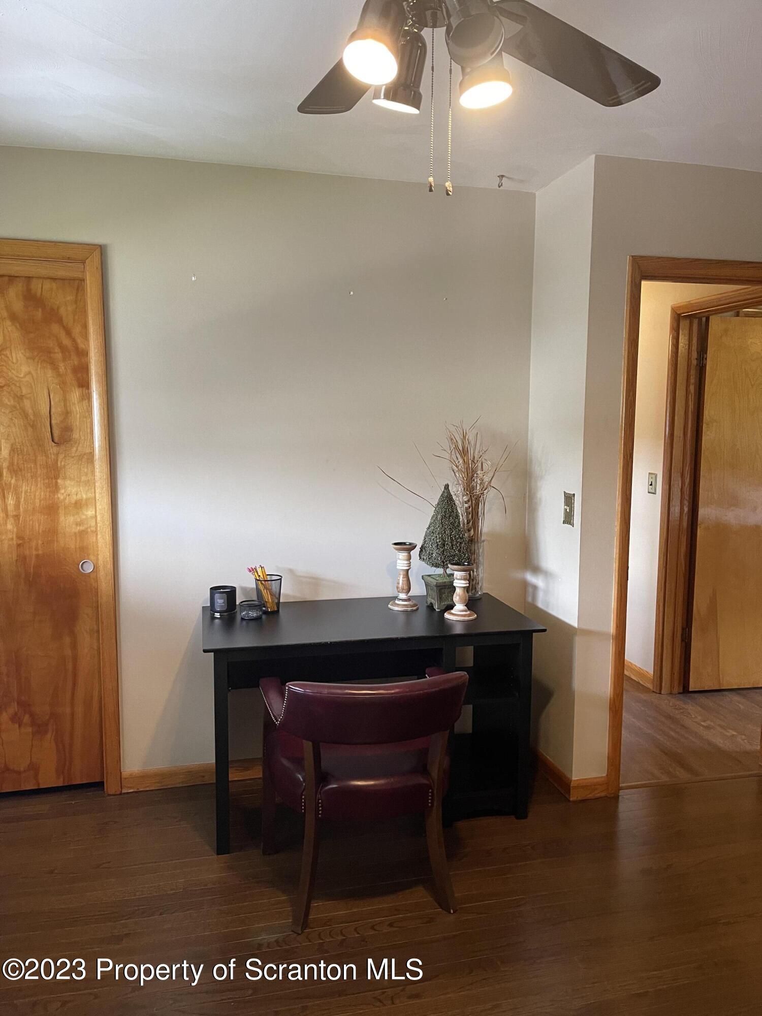 225 Main Street Olyphant, PA 18447 - Photo 42 of 60 a view of a workspace with furniture