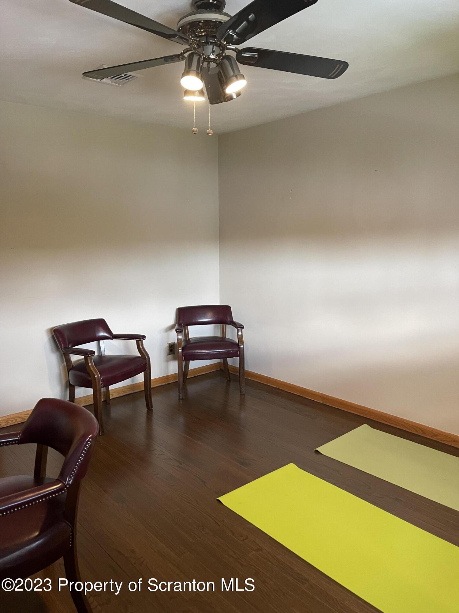 225 Main Street Olyphant, PA 18447 - Photo 43 of 60 a room with chairs and a table