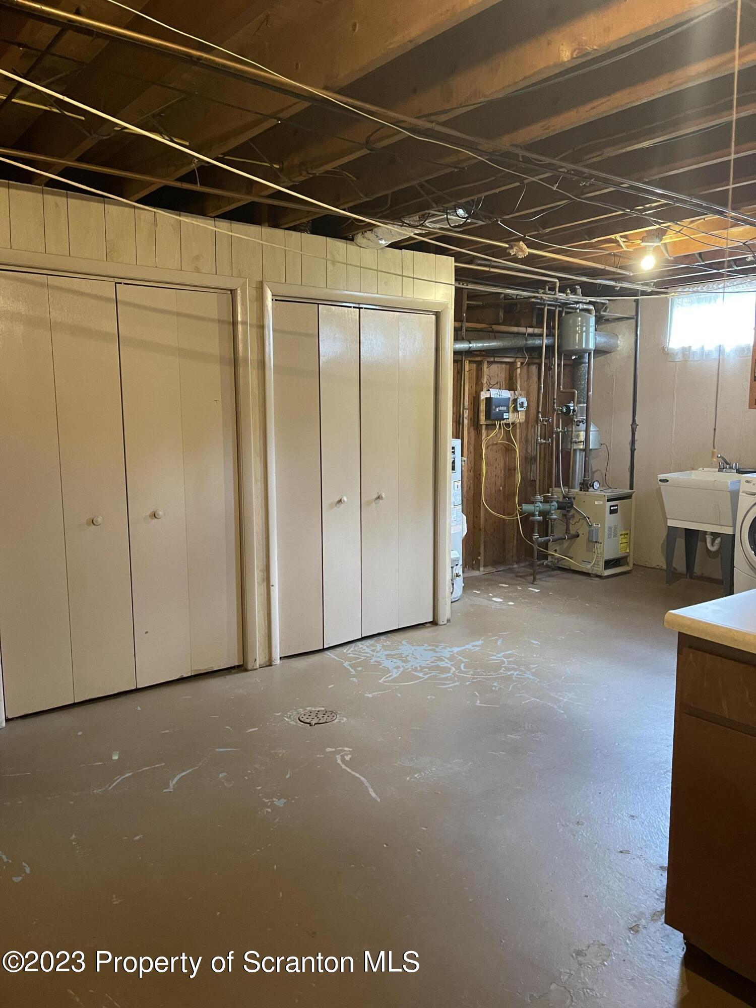 225 Main Street Olyphant, PA 18447 - Photo 56 of 60 a view of water heater room