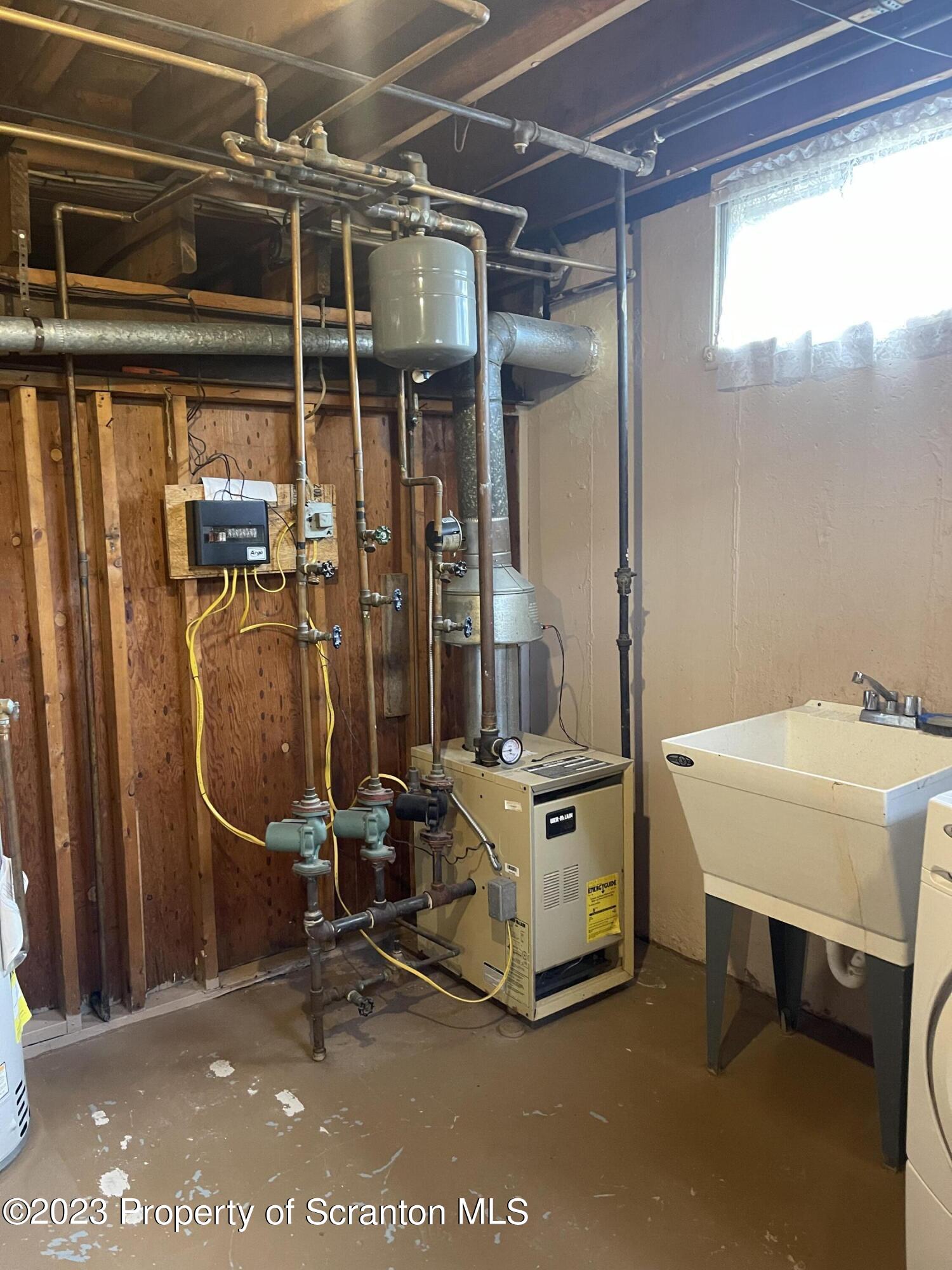 225 Main Street Olyphant, PA 18447 - Photo 58 of 60 a view of a room with gym equipment