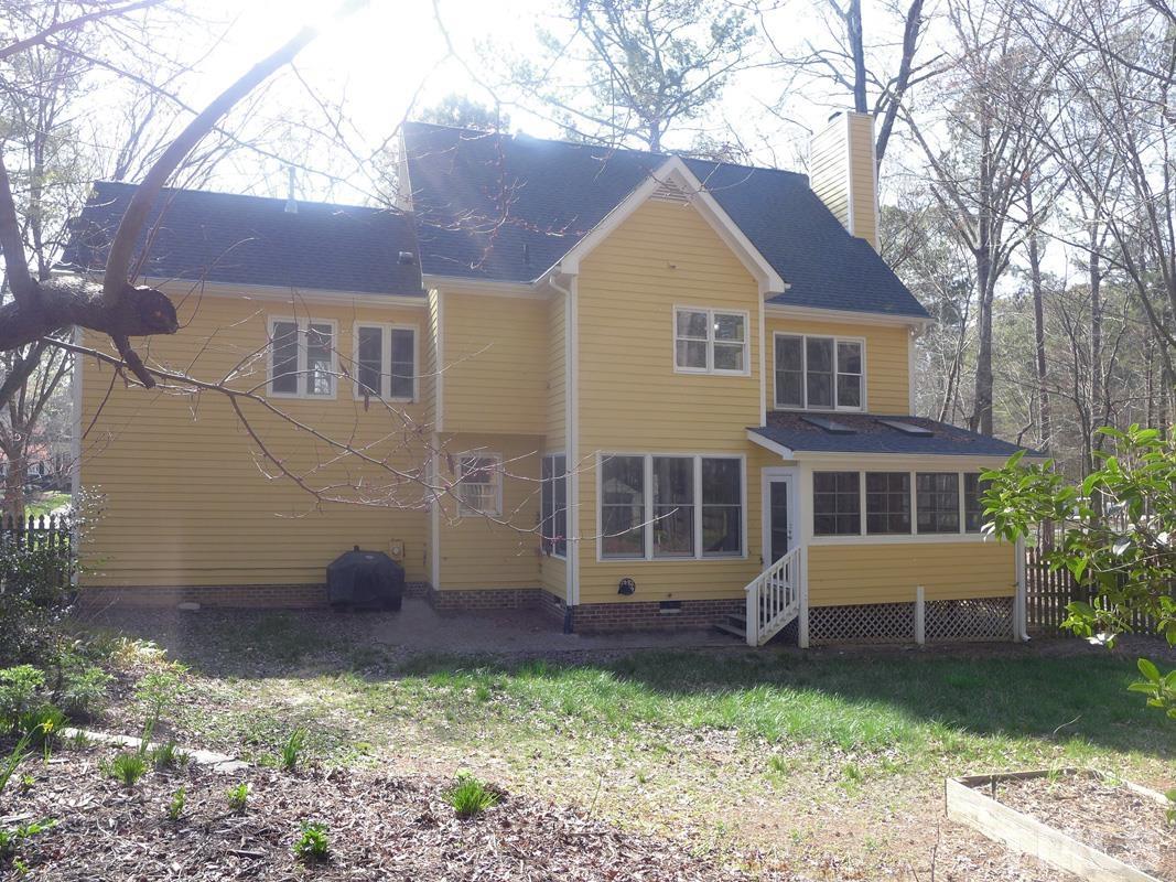 2003 Whitmore Circle Chapel Hill, NC 27516 - Photo 33 of 35 a front view of a house with a garden