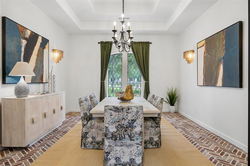 1620 Timber Ridge Lane Keller, TX 76262 - Photo 12 of 40 The elegant dining room with custom doors directly off the kitchen is perfect for entertaining and functionality