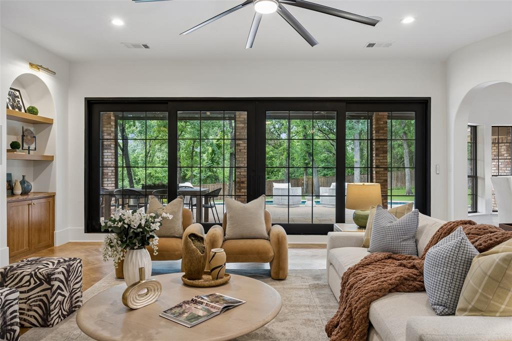 1620 Timber Ridge Lane Keller, TX 76262 - Photo 3 of 40 Expansive sliding glass doors frame the serene backyard view and creates effortless indoor-outdoor living