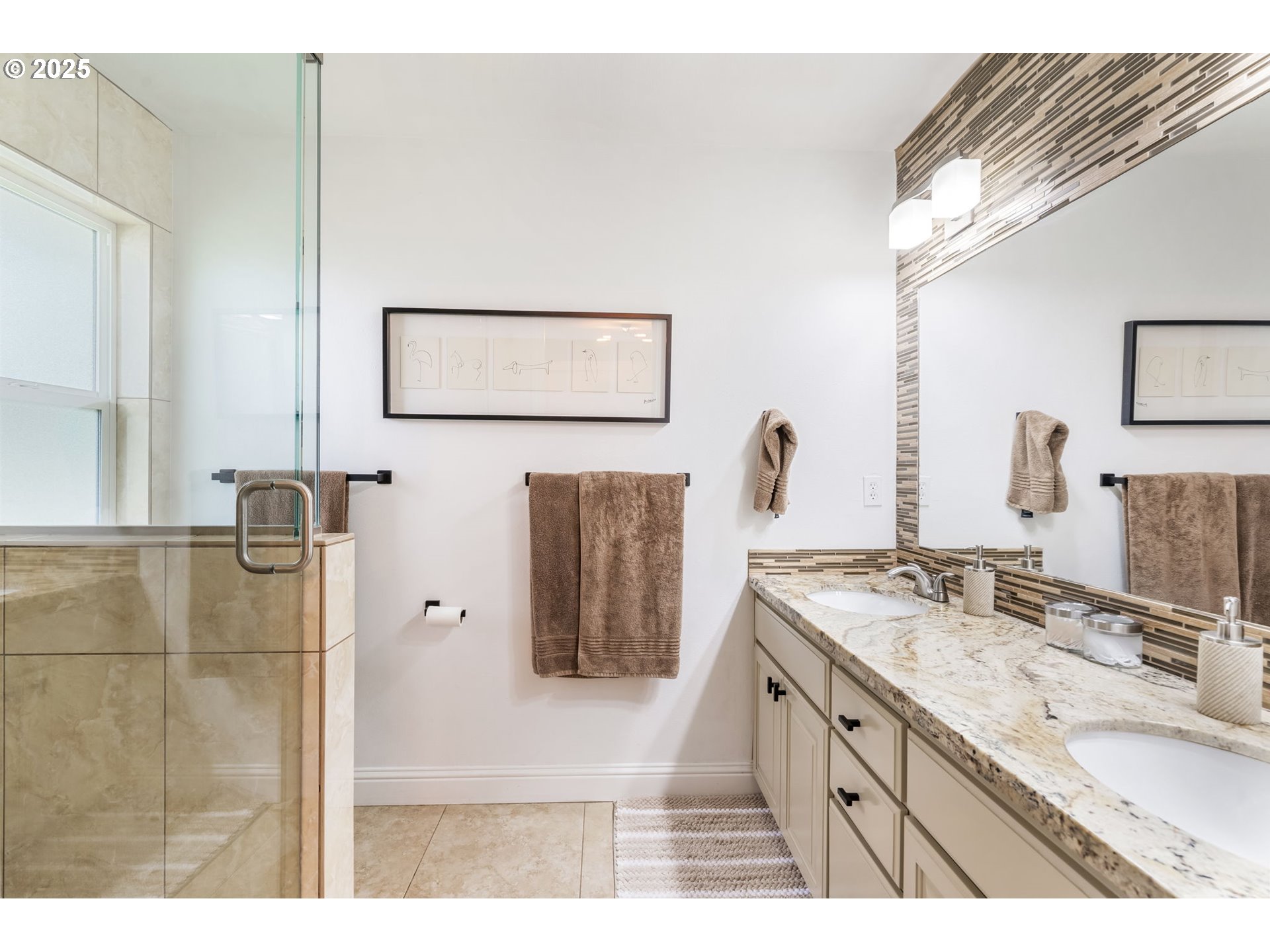 4933 Southwest 18th Place Portland, OR 97239 - Photo 19 of 43 a bathroom with a sink and mirror