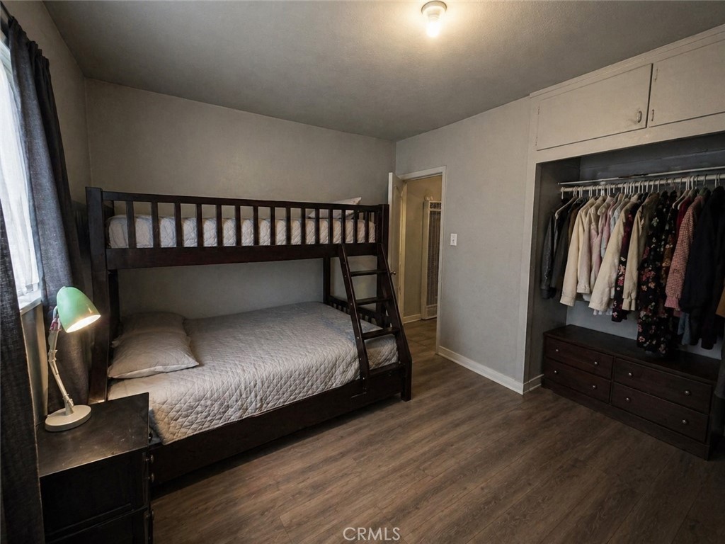 3904 Monroe Street Riverside, CA 92503 - Photo 11 of 22 a bedroom with a bed and a tv on the dresser