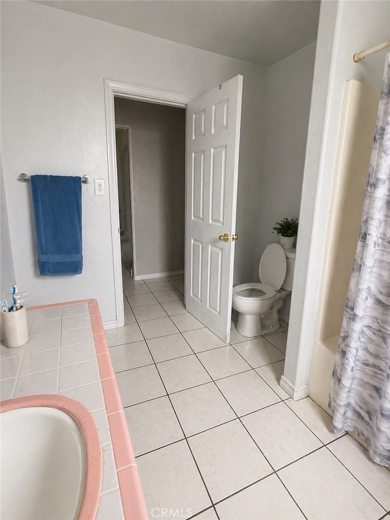 3904 Monroe Street Riverside, CA 92503 - Photo 15 of 22 a bathroom with a sink and a toilet