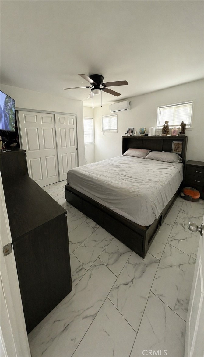 3904 Monroe Street Riverside, CA 92503 - Photo 21 of 22 a bedroom with a bed and window