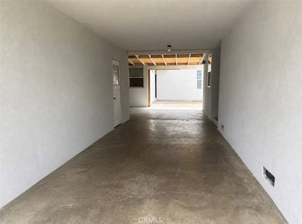 3904 Monroe Street Riverside, CA 92503 - Photo 5 of 22 a view of a room with an empty space and a window