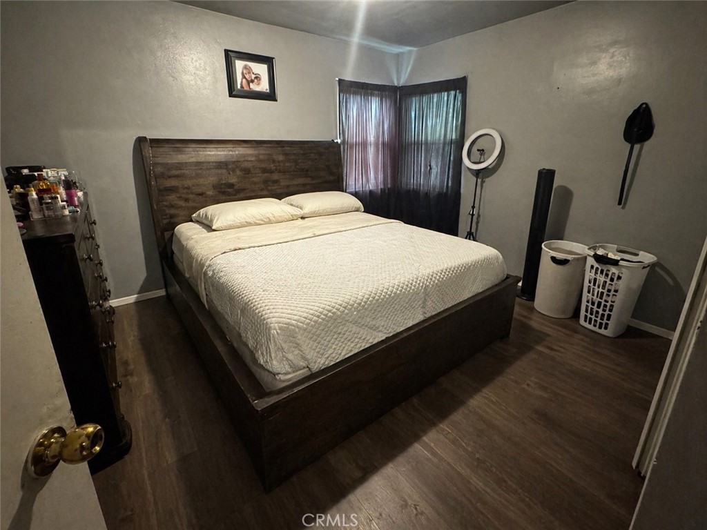 3904 Monroe Street Riverside, CA 92503 - Photo 7 of 22 a bed sitting in a bedroom and mirror