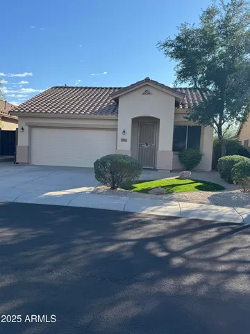 a view of a backyard with large trees
