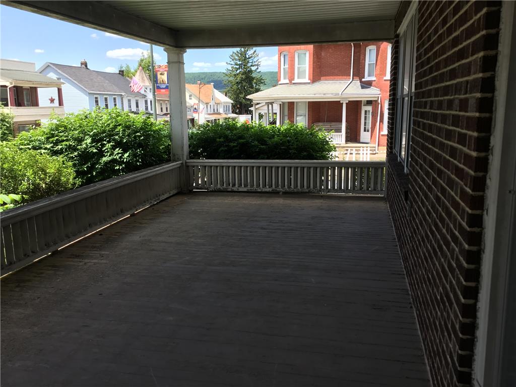 1105 Main Street Slatington, PA 18080 - Photo 27 of 31 An inviting covered porch offers a serene neighborhood overlook.