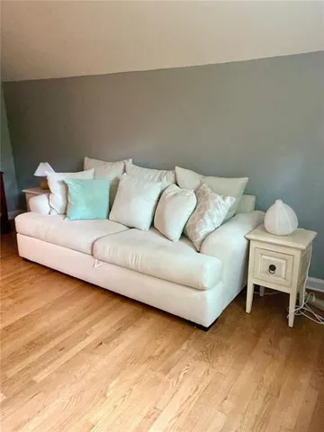a living room with a couch and a table