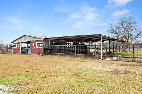 a view of a house with a swimming pool