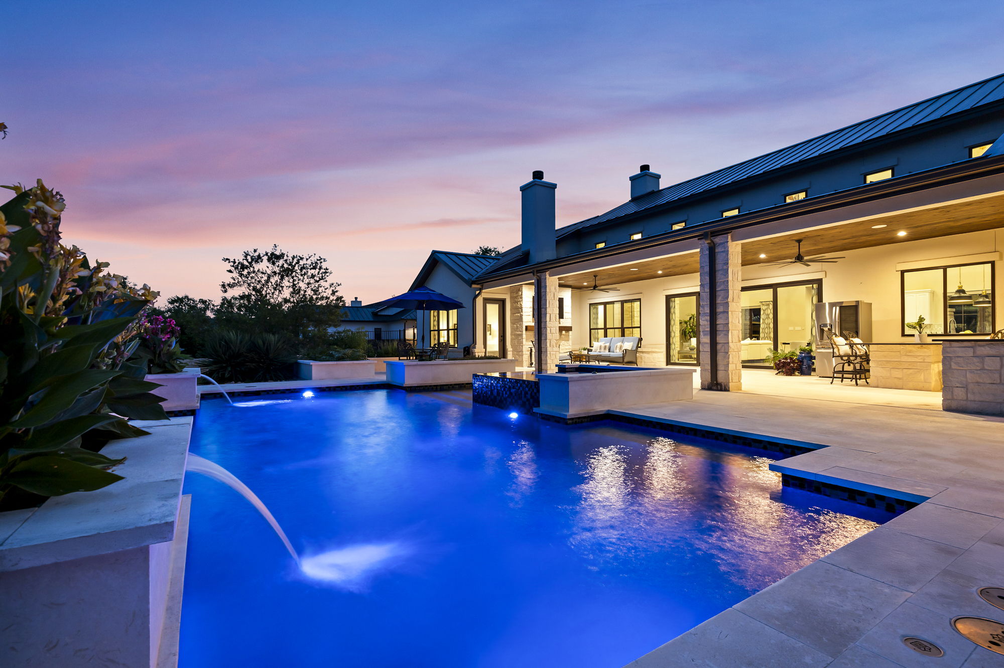 Swimming pool featuring ceiling fan, a patio area, an outdoor living space, and area for grilling