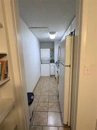 a bathroom with a shower and a sink