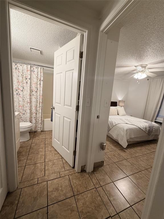 2490 Southwest 14th Drive, Unit 29 Gainesville, FL 32608 - Photo 9 of 20 a bathroom with a sink and a mirror