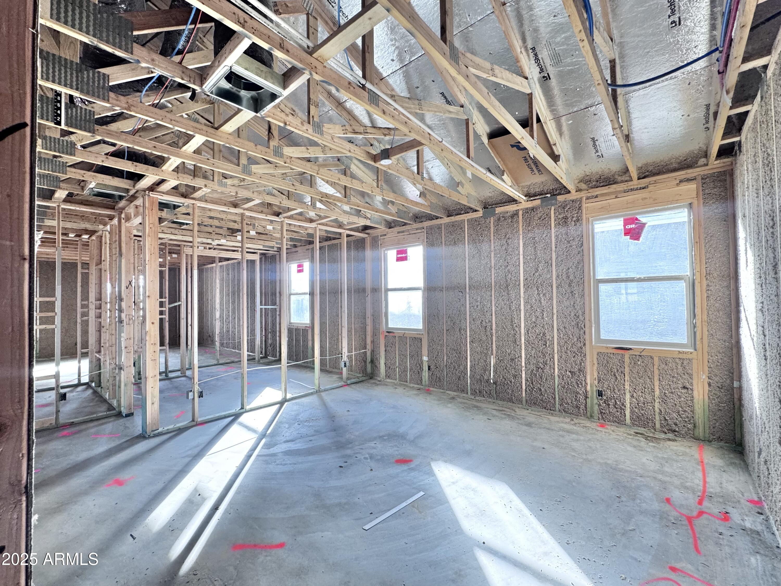 15715 West Camden Avenue Waddell, AZ 85355 - Photo 7 of 20 a view of a room with wooden walls